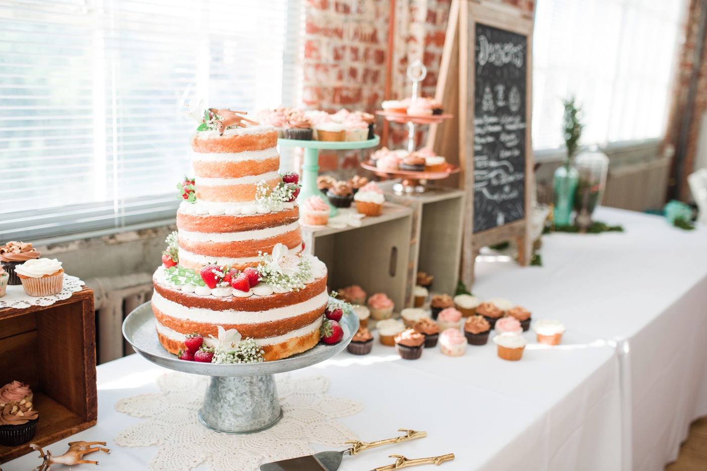 Naked Wedding Cake with Srawberries - Dessert table photo